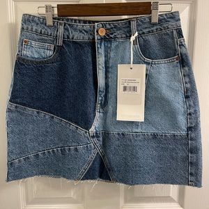 Eleven Paris medium blue denim patchwork mini skirt.
